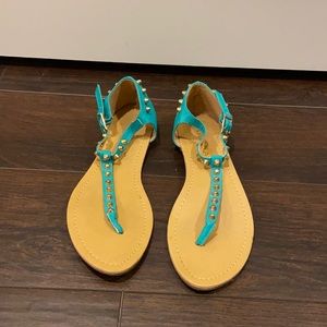 Blue/green sandals with spikes